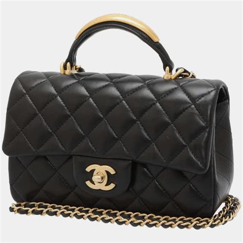 flap bag with top handle chanel black|25cm Chanel flap bag.